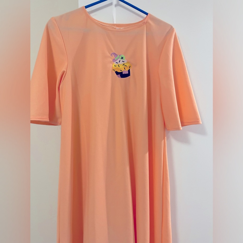 Handmade dress with embroidered Halloween cupcake